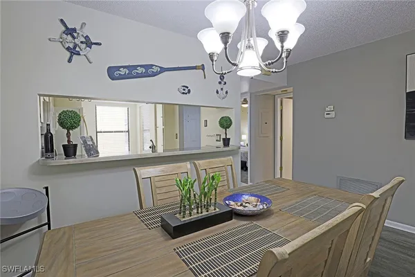 a dining room with wooden floor