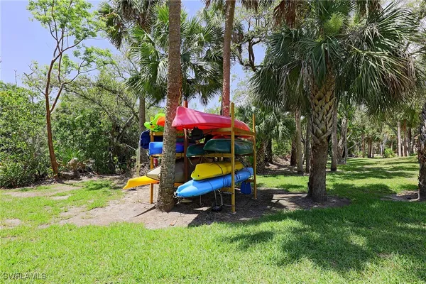 an outdoor sitting area with golf course