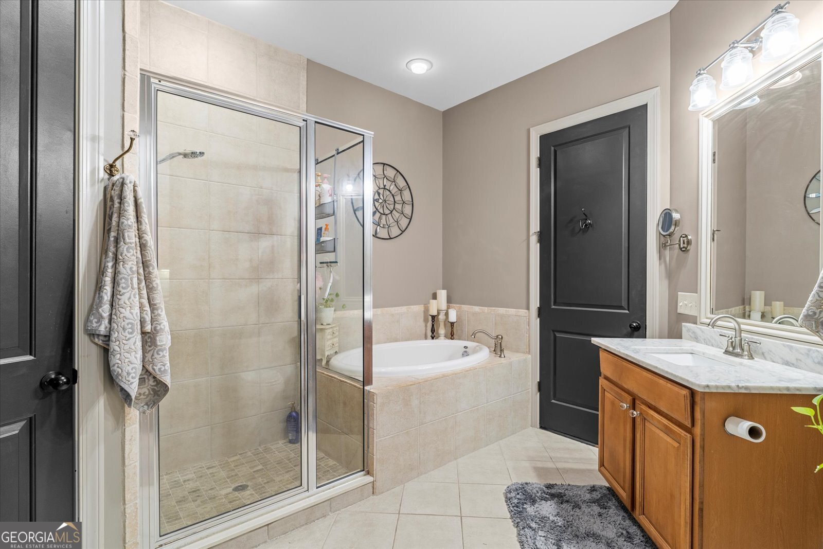 360 Chambers Street Woodstock, GA 30188 - Photo 21 of 50 a bathroom with a double vanity sink mirror and shower