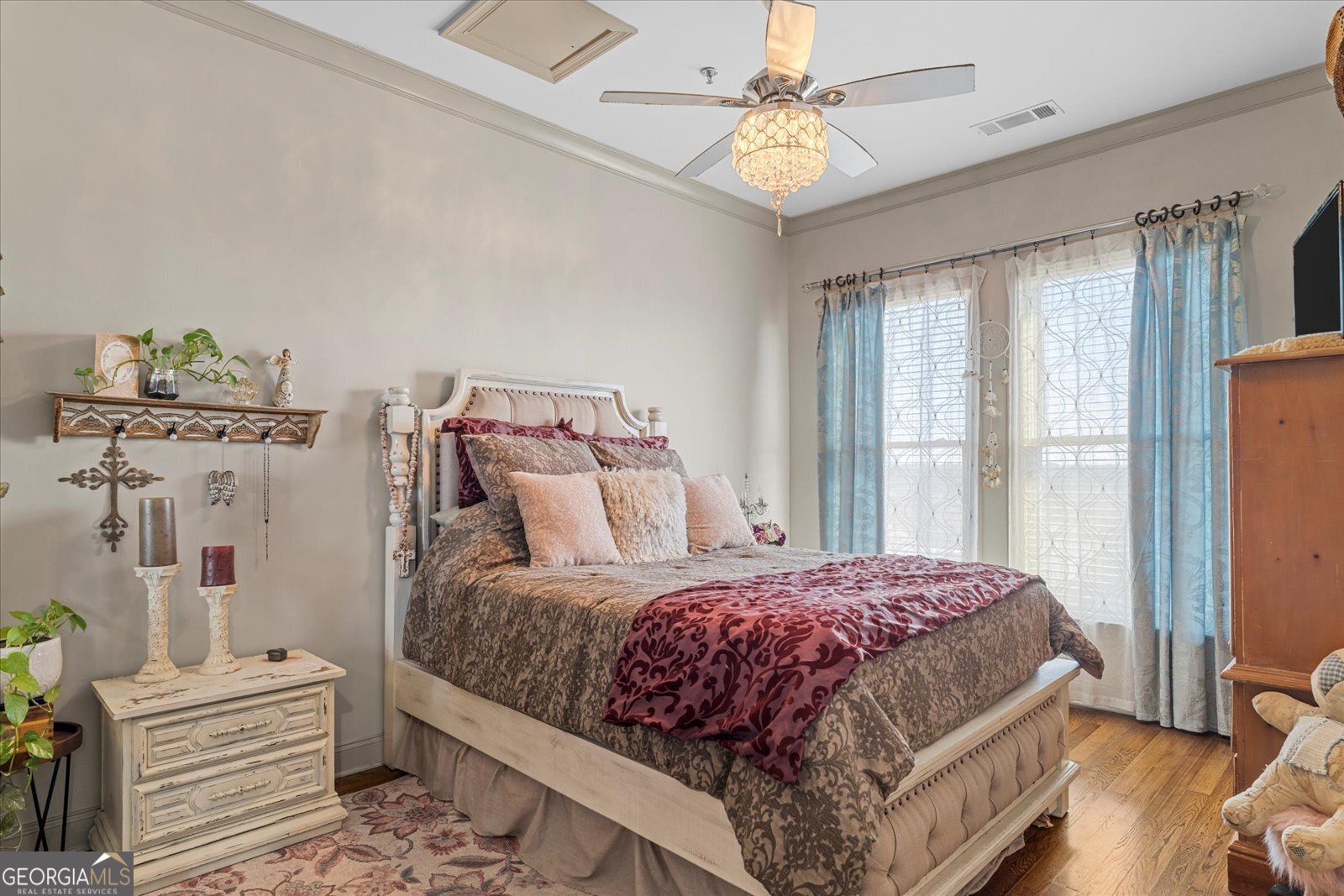 360 Chambers Street Woodstock, GA 30188 - Photo 25 of 50 a bedroom with a bed wooden floor and window