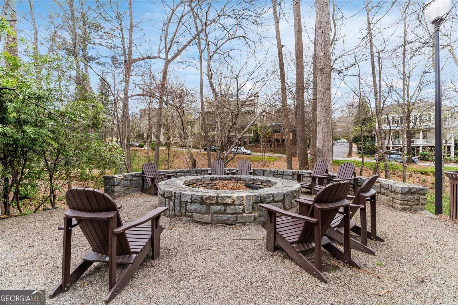 360 Chambers Street Woodstock, GA 30188 - Photo 32 of 50 a view of a patio with table and chairs and potted plants