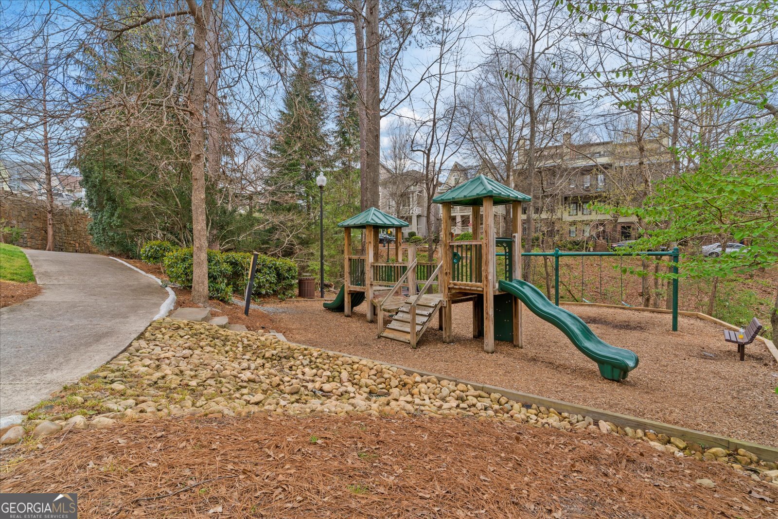 360 Chambers Street Woodstock, GA 30188 - Photo 33 of 50 a view of a park with swings and slides