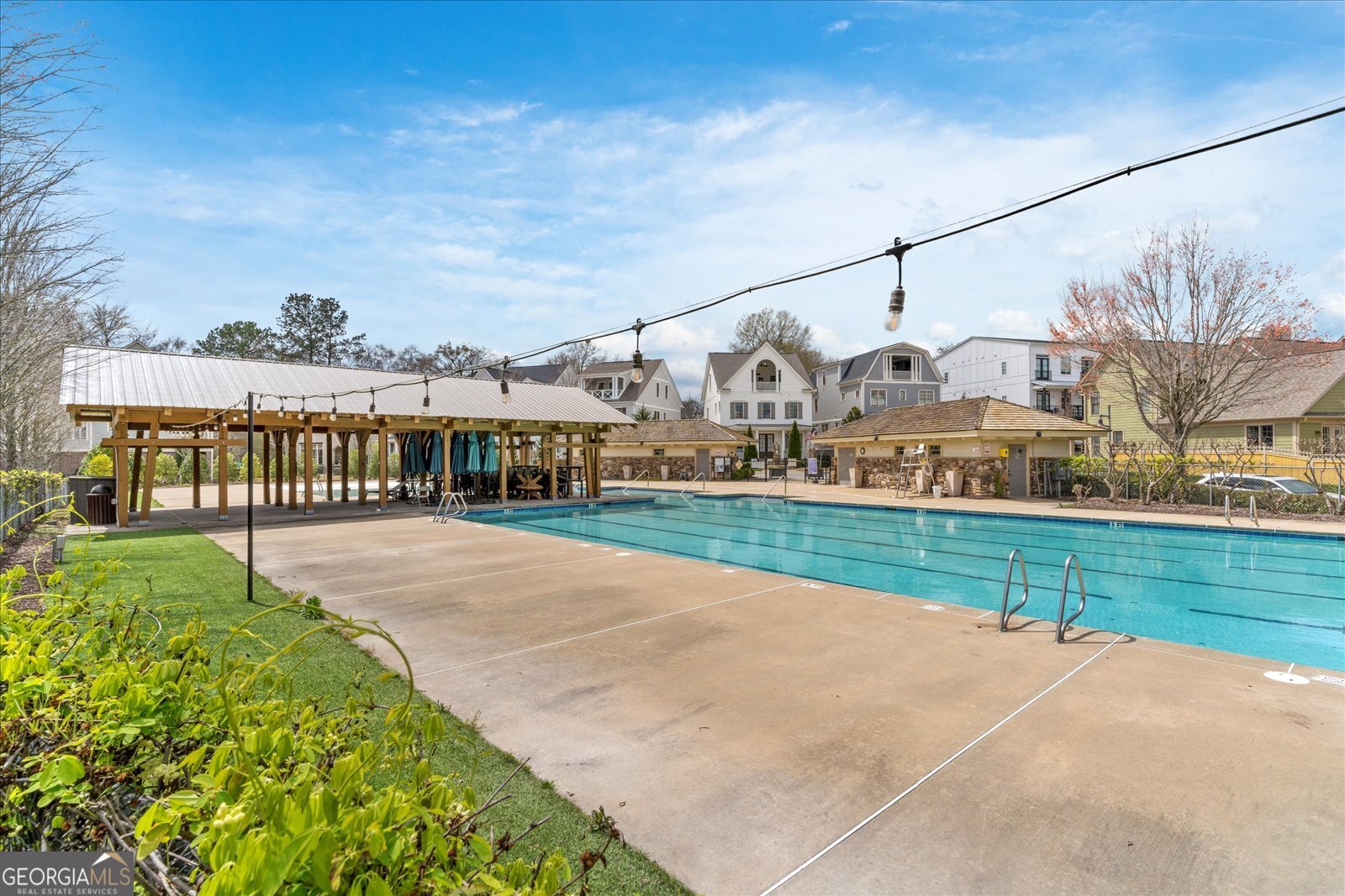 360 Chambers Street Woodstock, GA 30188 - Photo 35 of 50 a view of a street with a houses in the back