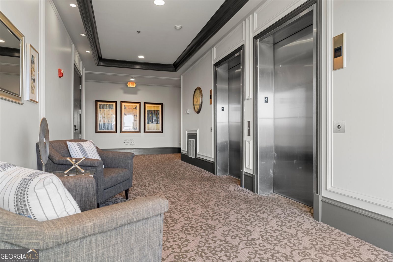 360 Chambers Street Woodstock, GA 30188 - Photo 4 of 50 a living room with couches and a refrigerator