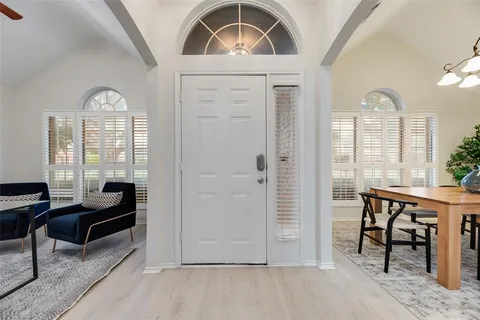 a view of a livingroom with furniture and window
