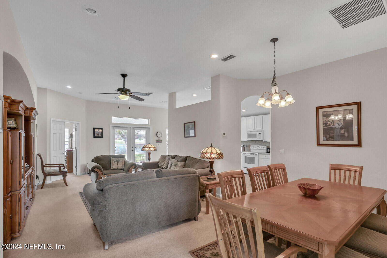 810 East Red House Branch Road St. Augustine, FL 32084 - Photo 12 of 33 a living room with furniture chandelier and a chandelier