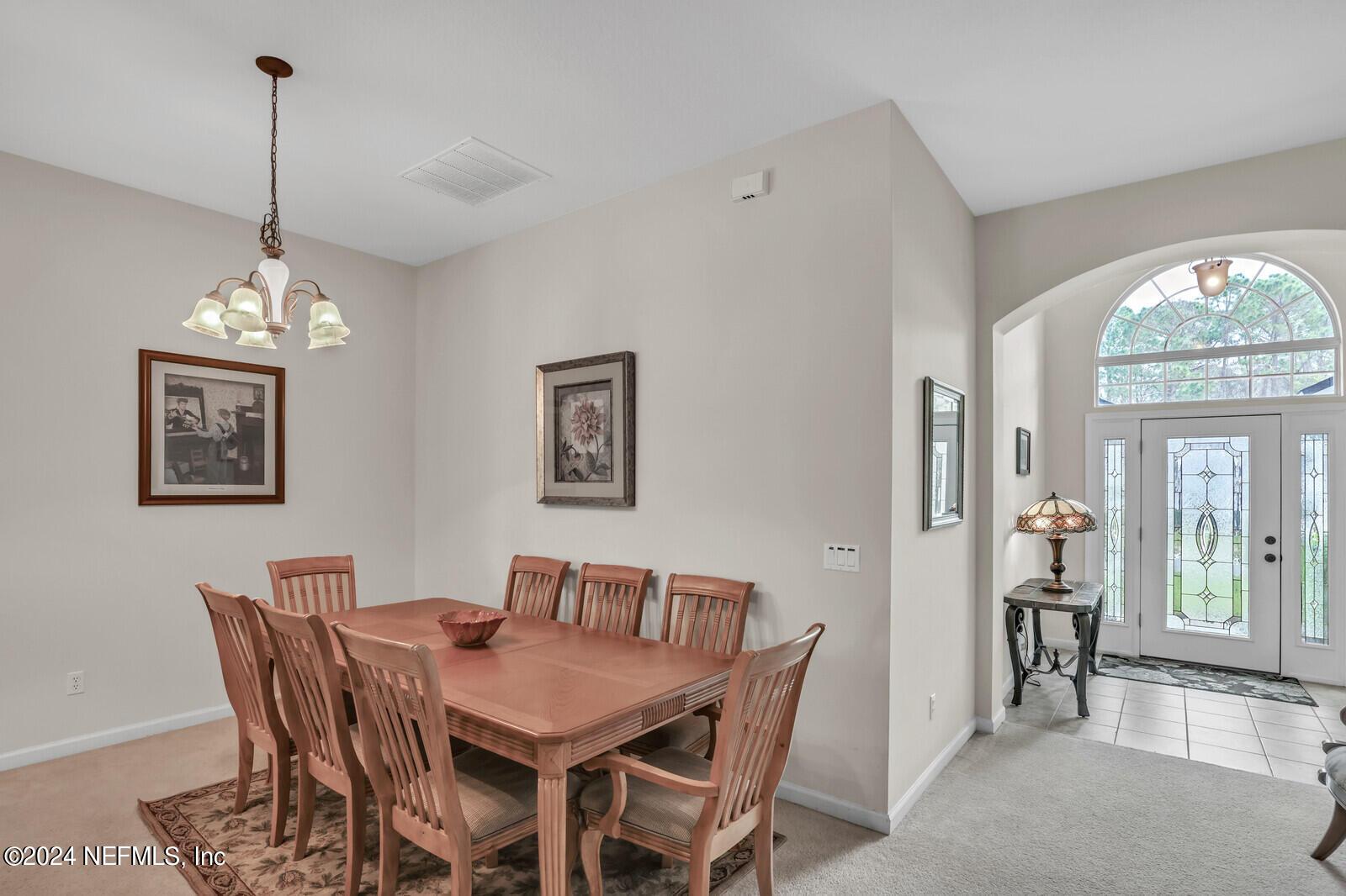 810 East Red House Branch Road St. Augustine, FL 32084 - Photo 6 of 33 a view of a dining room with furniture window and wooden floor