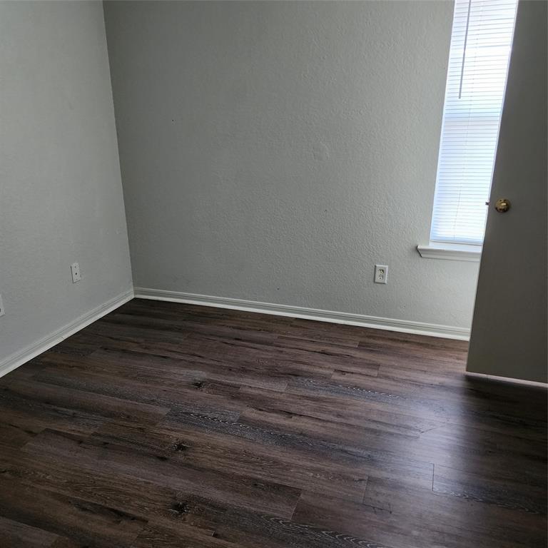 1403 Pima Trail Harker Heights, TX 76548 - Photo 5 of 5 a view of wooden floor and cabinets in a room
