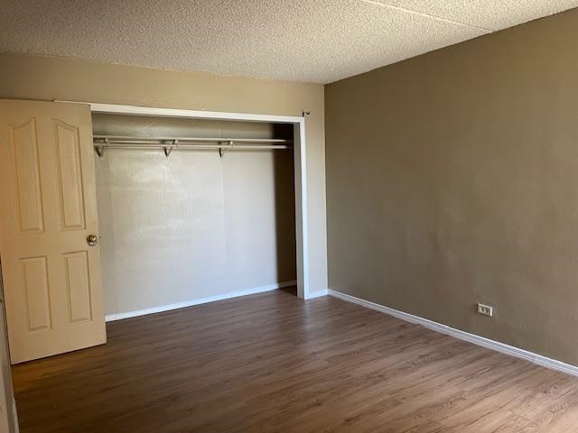111 Kahului Beach Road, Unit C213 Kahului, HI 96732 - Photo 7 of 8 a view of an empty room with wooden floor