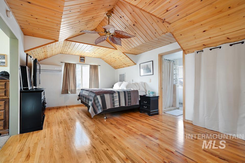 7025 Bluebird Lane Sweet, ID 83670 - Photo 23 of 46 Bedroom with wooden ceiling, a ceiling fan, and light wood finished floors