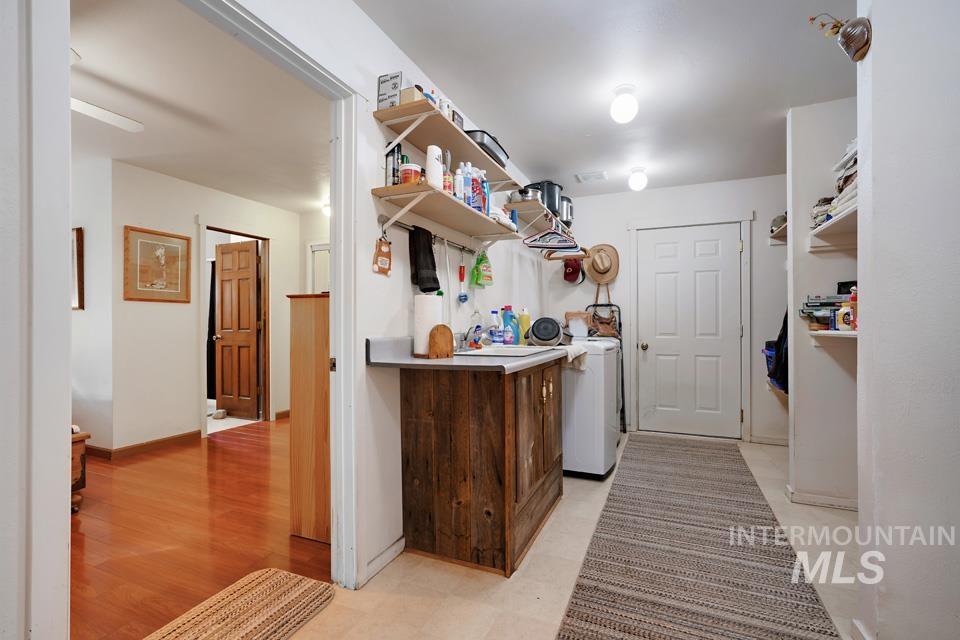 7025 Bluebird Lane Sweet, ID 83670 - Photo 36 of 46 Laundry room featuring washing machine and dryer