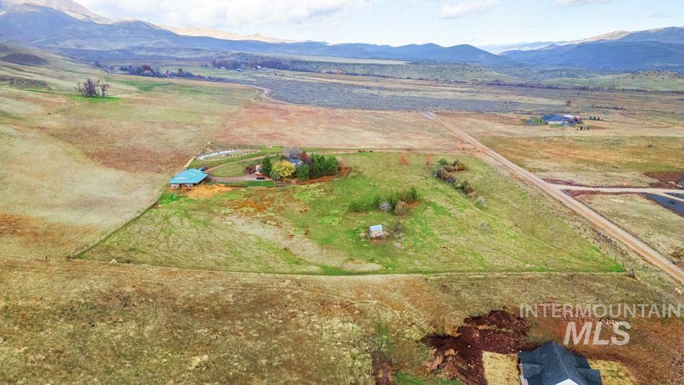7025 Bluebird Lane Sweet, ID 83670 - Photo 45 of 46 Aerial overview of property's location featuring rural landscape and mountains