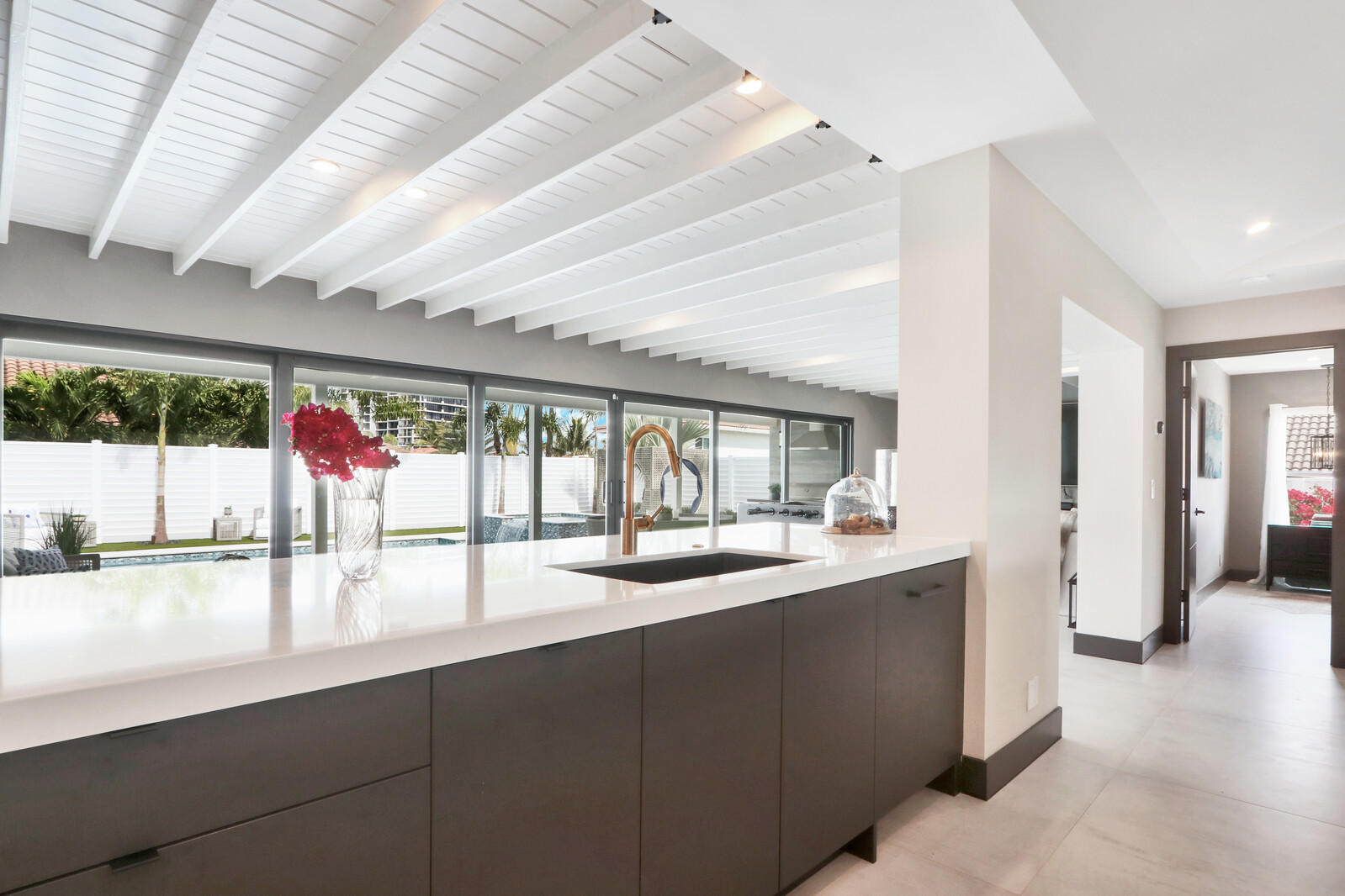 441 South Lyra Circle Juno Beach, FL 33408 - Photo 32 of 72 View from kitchen to outdoor patio