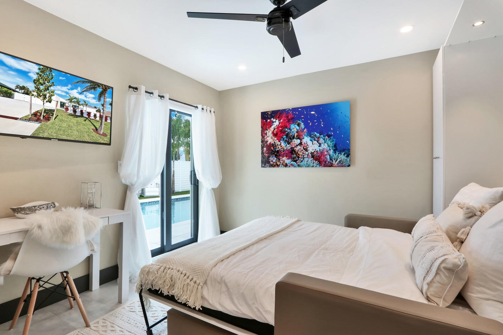 441 South Lyra Circle Juno Beach, FL 33408 - Photo 45 of 72 Bedroom with sliders to patio