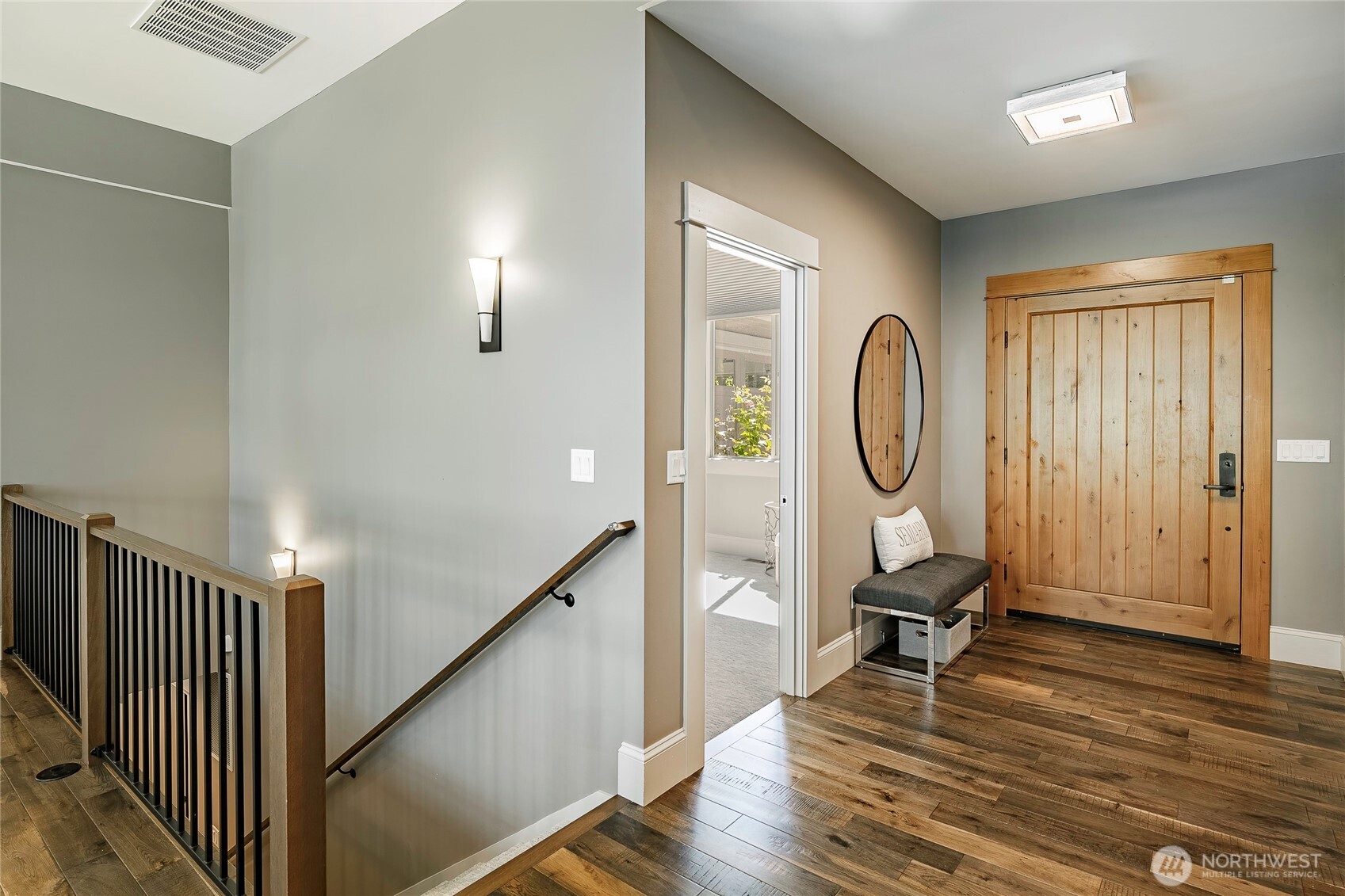9125 Shearwater Road Blaine, WA 98230 - Photo 6 of 40 a view of a room with wooden floor mirror and windows