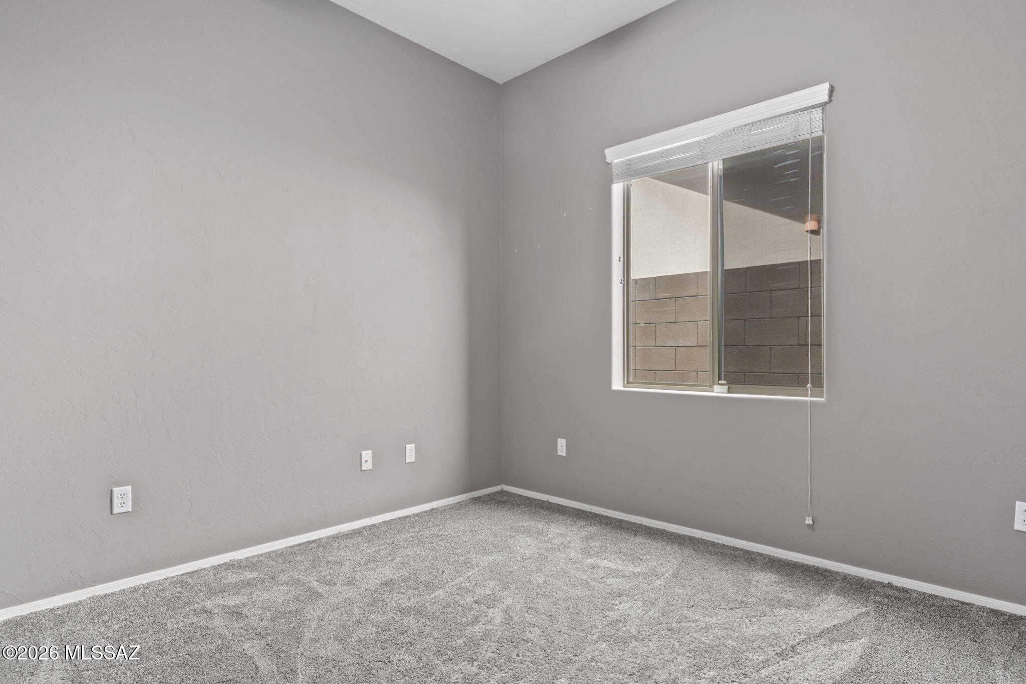 13668 East High Plains Ranch Street Vail, AZ 85641 - Photo 35 of 51 a view of an empty room with a window