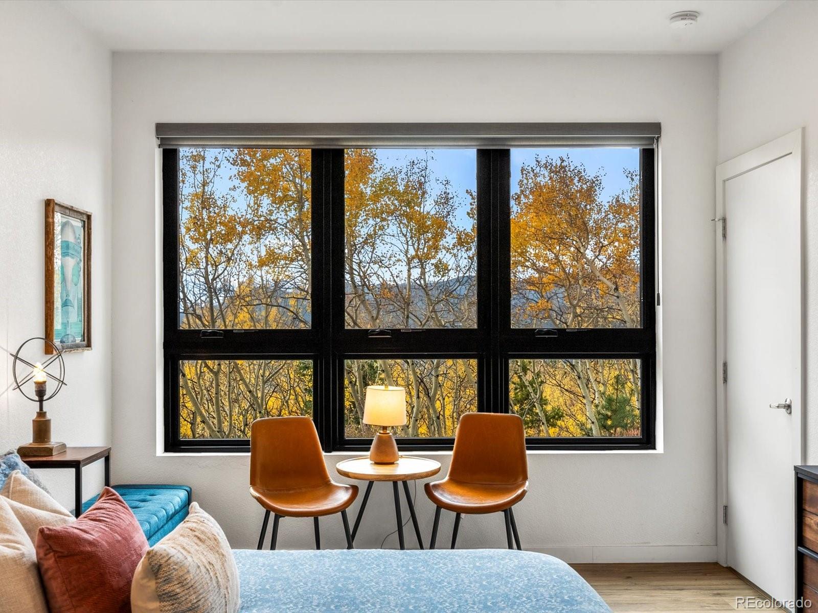 1044 Alps Hill Road Central City, CO 80427 - Photo 5 of 49 a living room with furniture and a large window