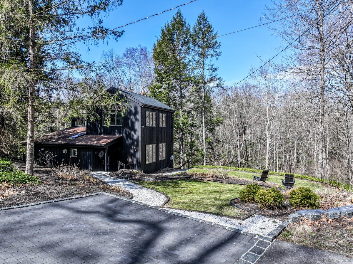 5 Short Lane Sherman, CT 06784 - Photo 1 of 1 a front view of a house with a yard and trees