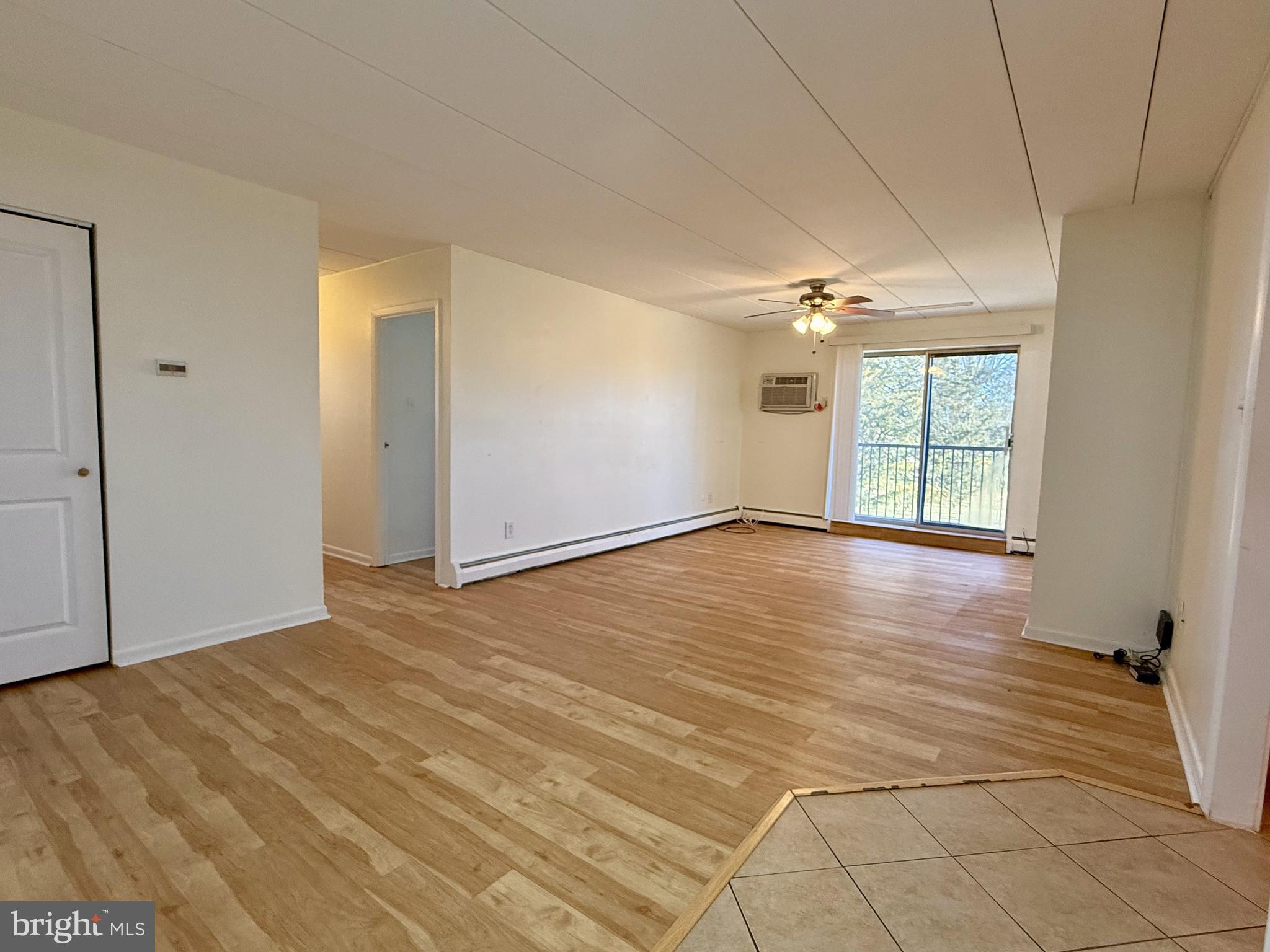 1575 West Street Road, Unit 327 Warminster, PA 18974 - Photo 2 of 17 a view of an empty room with a window