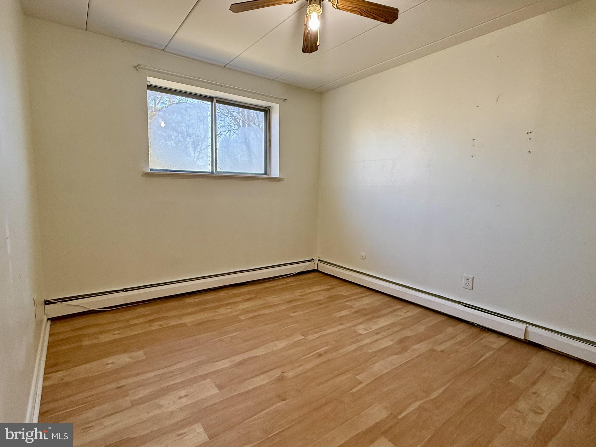 1575 West Street Road, Unit 327 Warminster, PA 18974 - Photo 6 of 17 a view of an empty room with a window