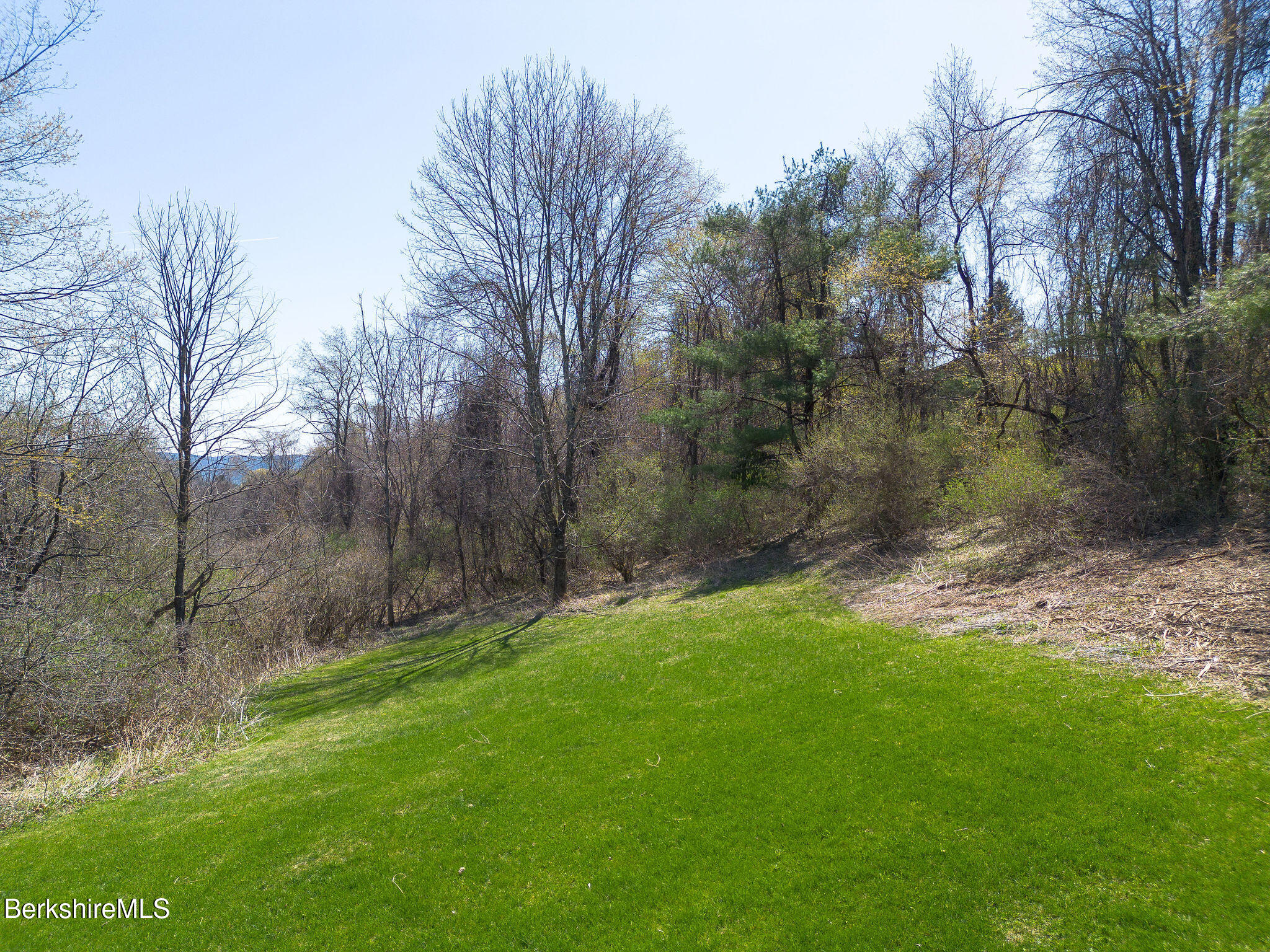 10 Miller View Road Egremont, MA 01230 - Photo 21 of 22 a backyard of a house with lots of green space and lake view