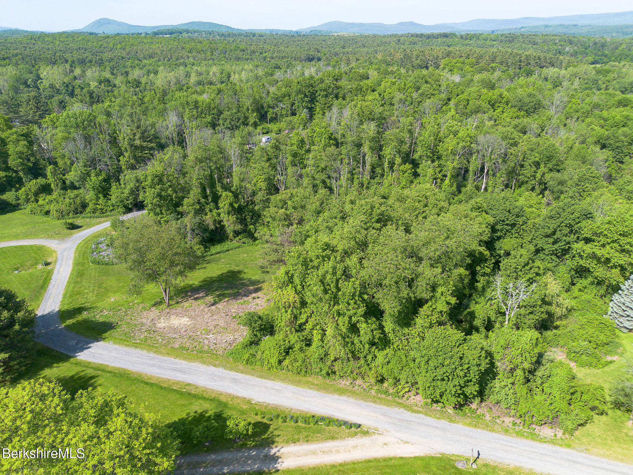 10 Miller View Road Egremont, MA 01230 - Photo 7 of 22 a view of a yard with an outdoor seating