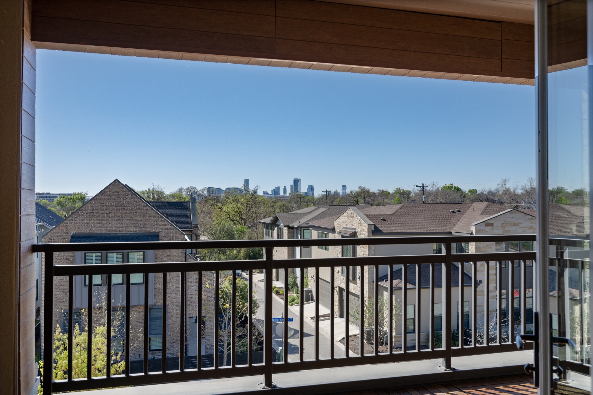 3901 Sightline Street, Unit 119 Austin, TX 78731 - Photo 20 of 24 Views of downtown skyline from 3rd floor covered patio