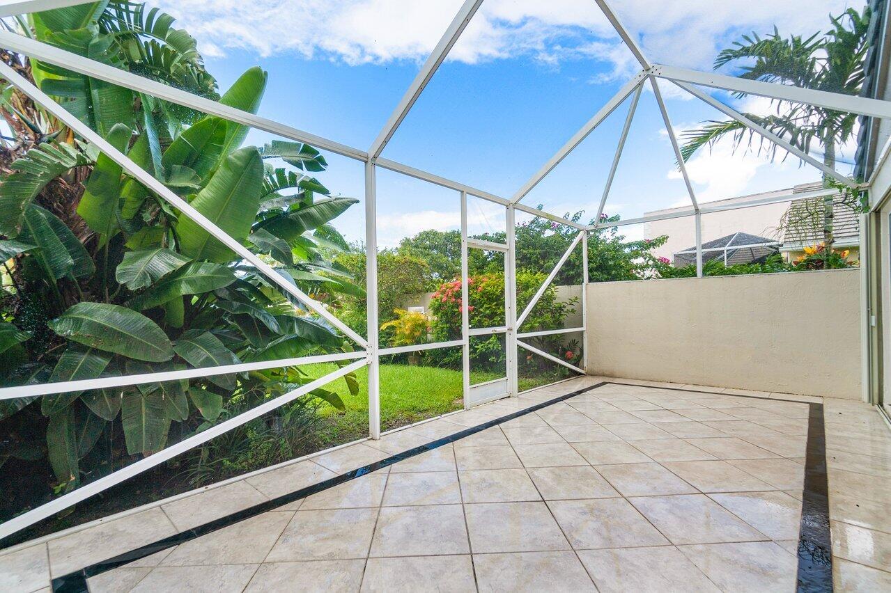 7809 Travelers Tree Drive Boca Raton, FL 33433 - Photo 12 of 33 a view of a tennis court