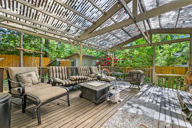 a view of a chairs on the roof deck