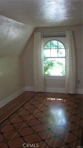 a view of a room with a window