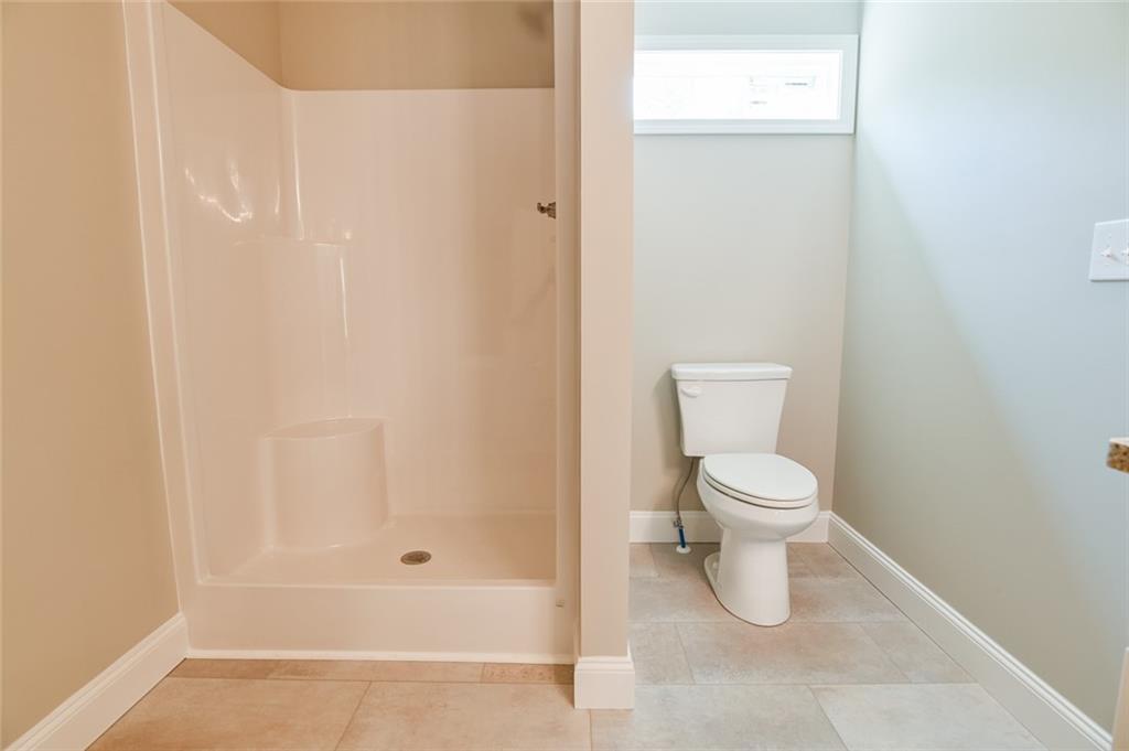 205 Perkins Road Dahlonega, GA 30533 - Photo 14 of 51 a bathroom with a toilet and shower