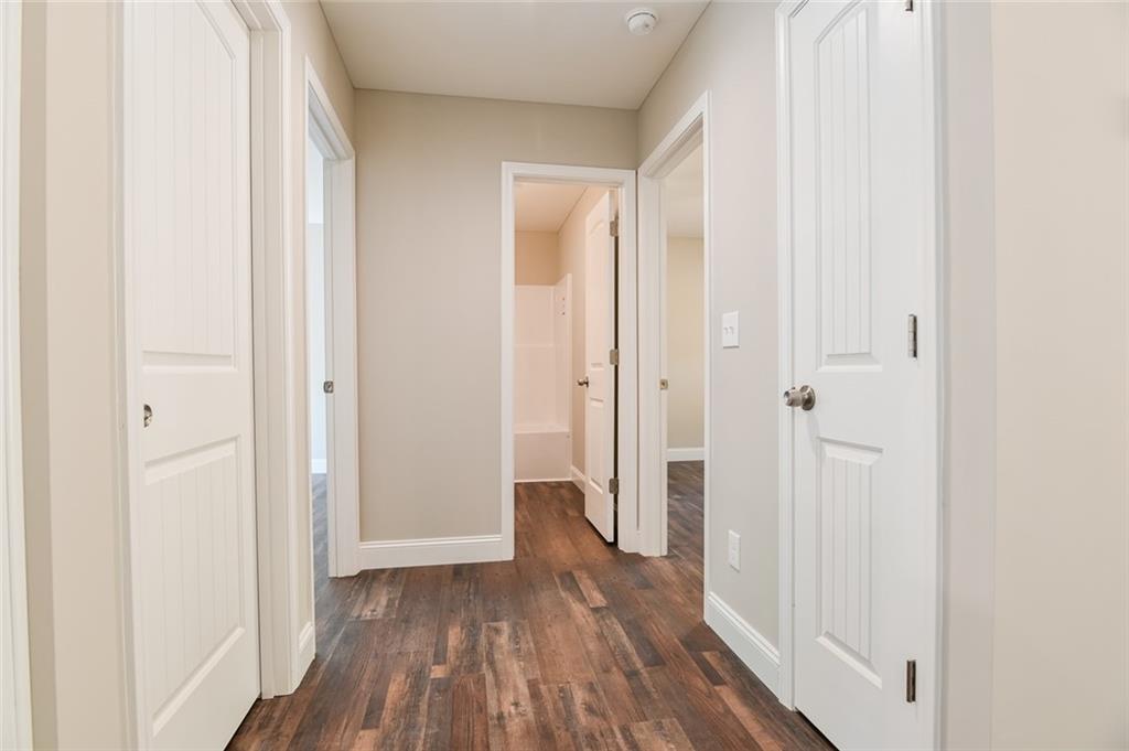 205 Perkins Road Dahlonega, GA 30533 - Photo 18 of 51 a view of a hallway with wooden floor
