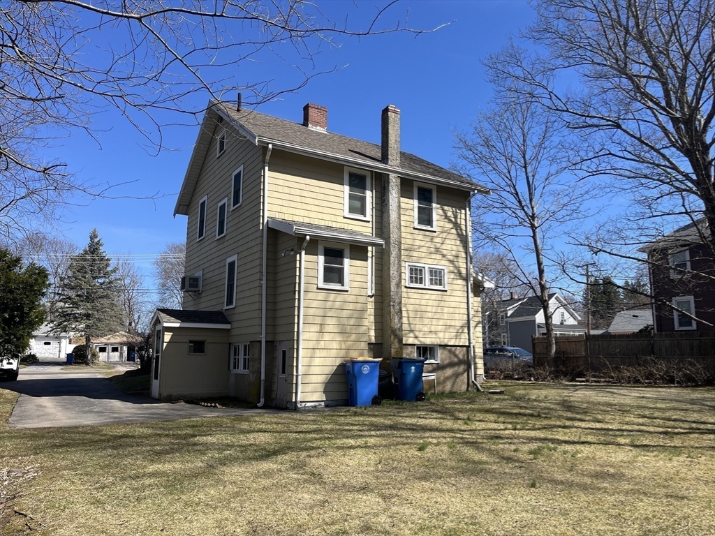 136 West Street Randolph, MA 02368 - Photo 11 of 13 a view of a house with a patio
