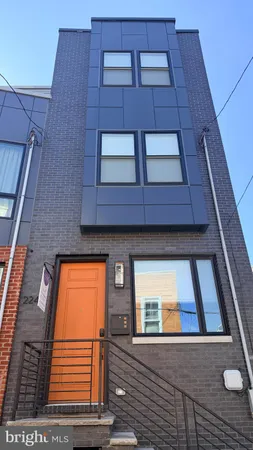 a building view with a brick wall