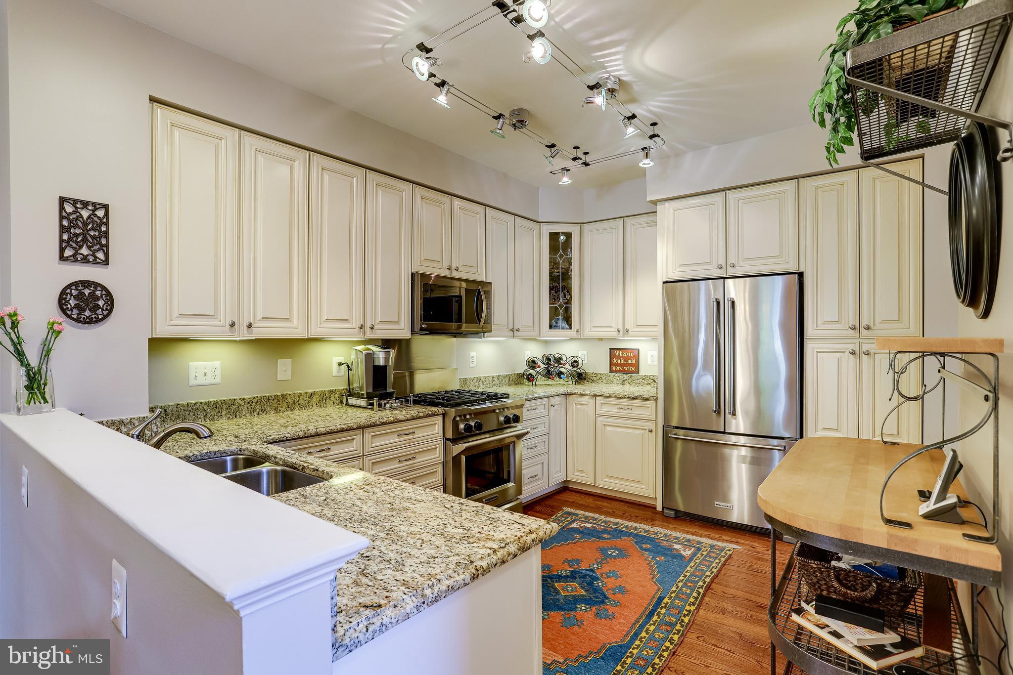 1206 Woodbrook Court Reston, VA 20194 - Photo 29 of 110 Updated kitchen with custom cabinetry.
