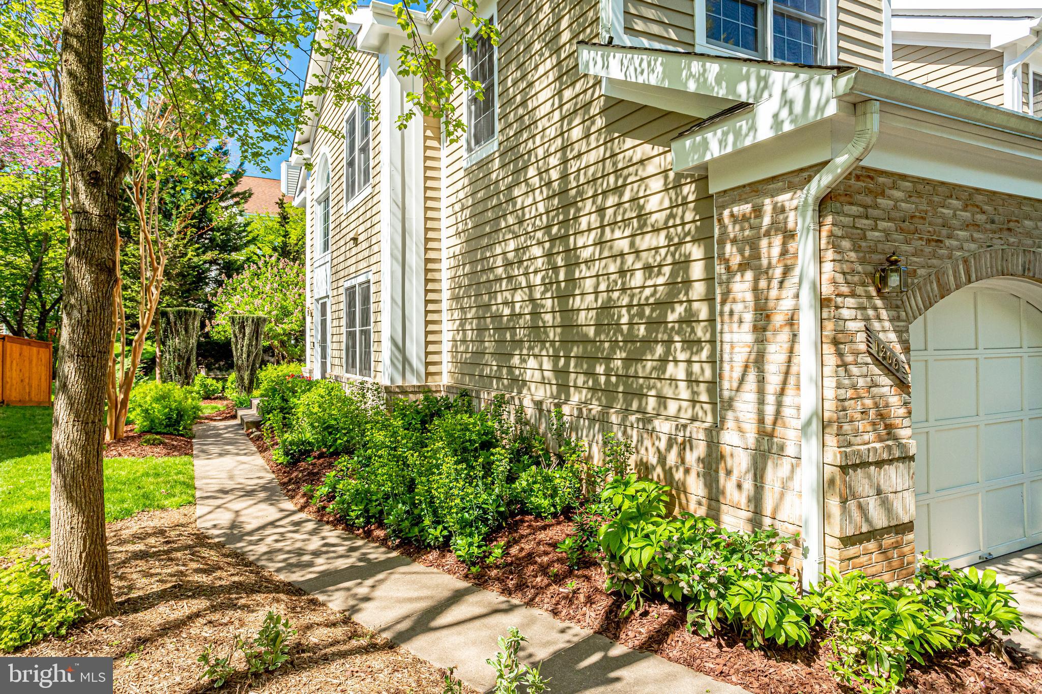 1206 Woodbrook Court Reston, VA 20194 - Photo 5 of 110 Professional landscaping around the property.