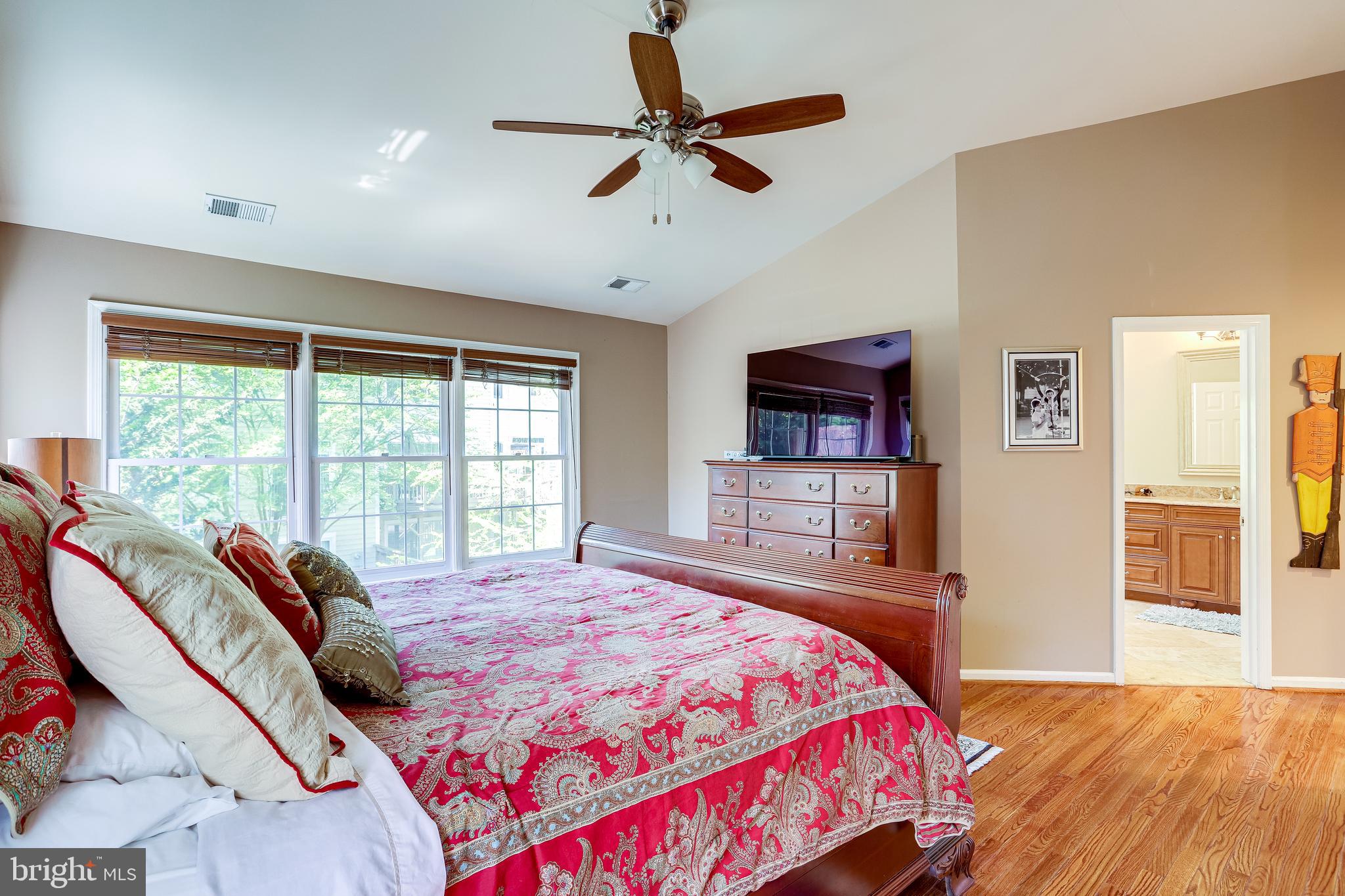 1206 Woodbrook Court Reston, VA 20194 - Photo 48 of 110 Large walk-in closet w/custom shelving in bedroom.