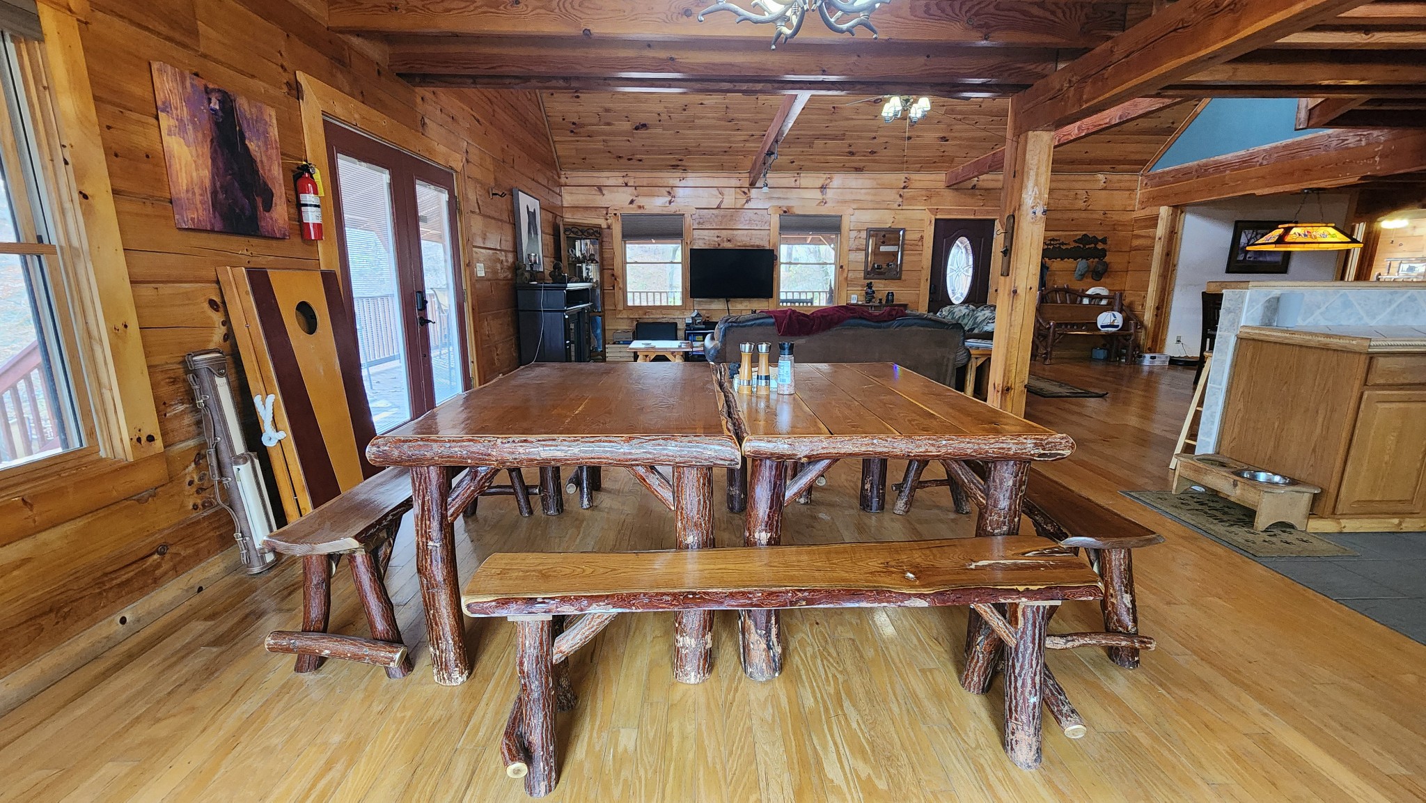 5615 Eastport Road Alpine, TN 38543 - Photo 25 of 83 a view of a swimming pool with a dining table and chairs