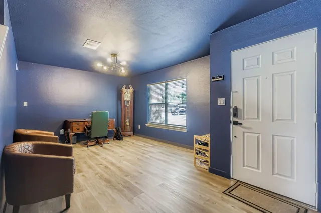 a room with furniture and a window