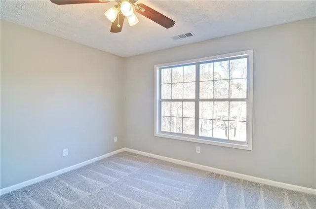 a view of hallway with closet