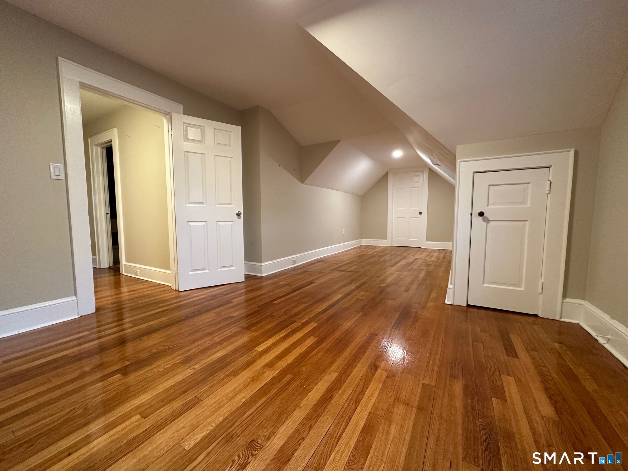70 Hawthorne Street Bridgeport, CT 06610 - Photo 18 of 23 a view of a room with wooden floor and brick walls
