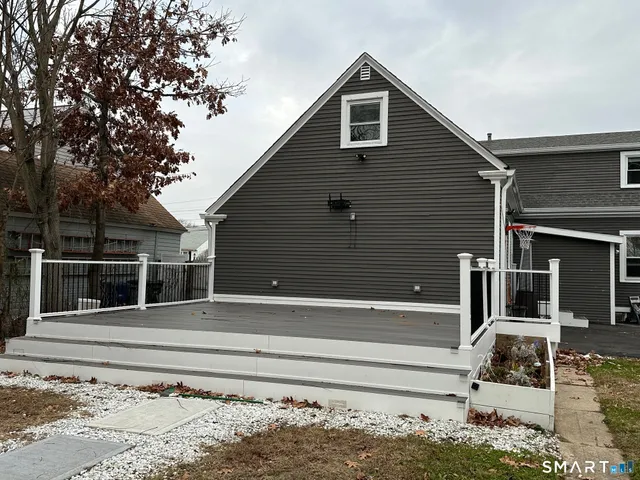 a view of backyard with small cabin