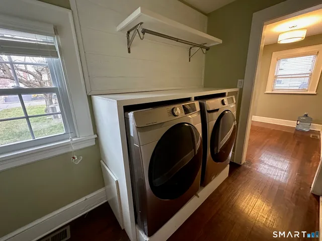 a utility room with dryer and washer