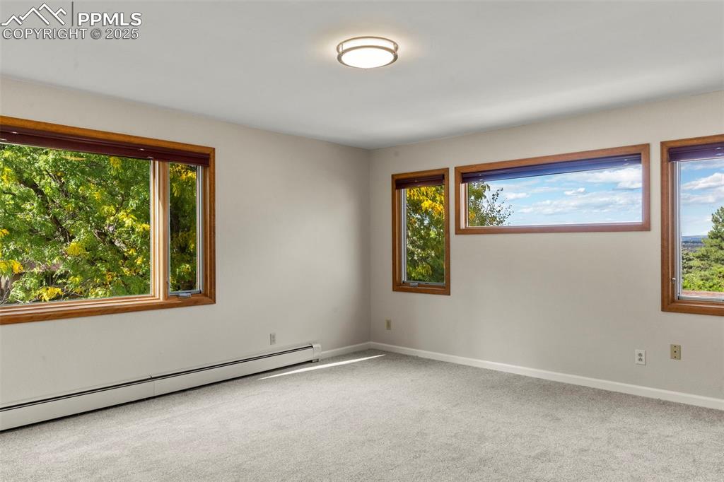 327 Clarksley Road Manitou Springs, CO 80829 - Photo 13 of 26 an empty room with a window