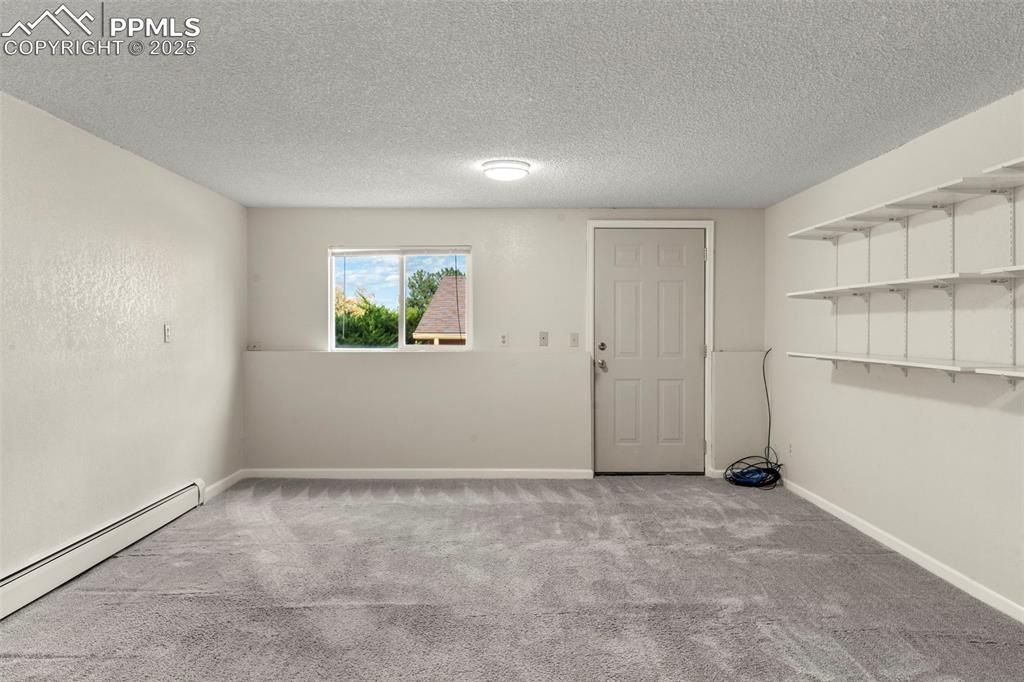 327 Clarksley Road Manitou Springs, CO 80829 - Photo 18 of 26 an empty room with closet area