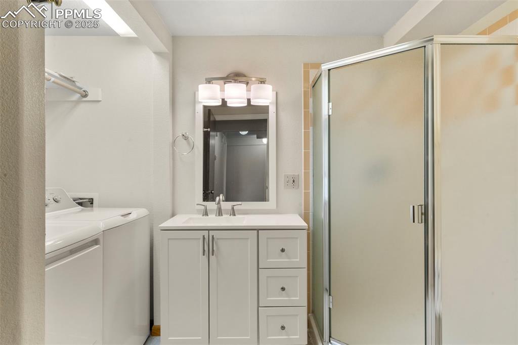 327 Clarksley Road Manitou Springs, CO 80829 - Photo 19 of 26 a bathroom with a sink and a mirror