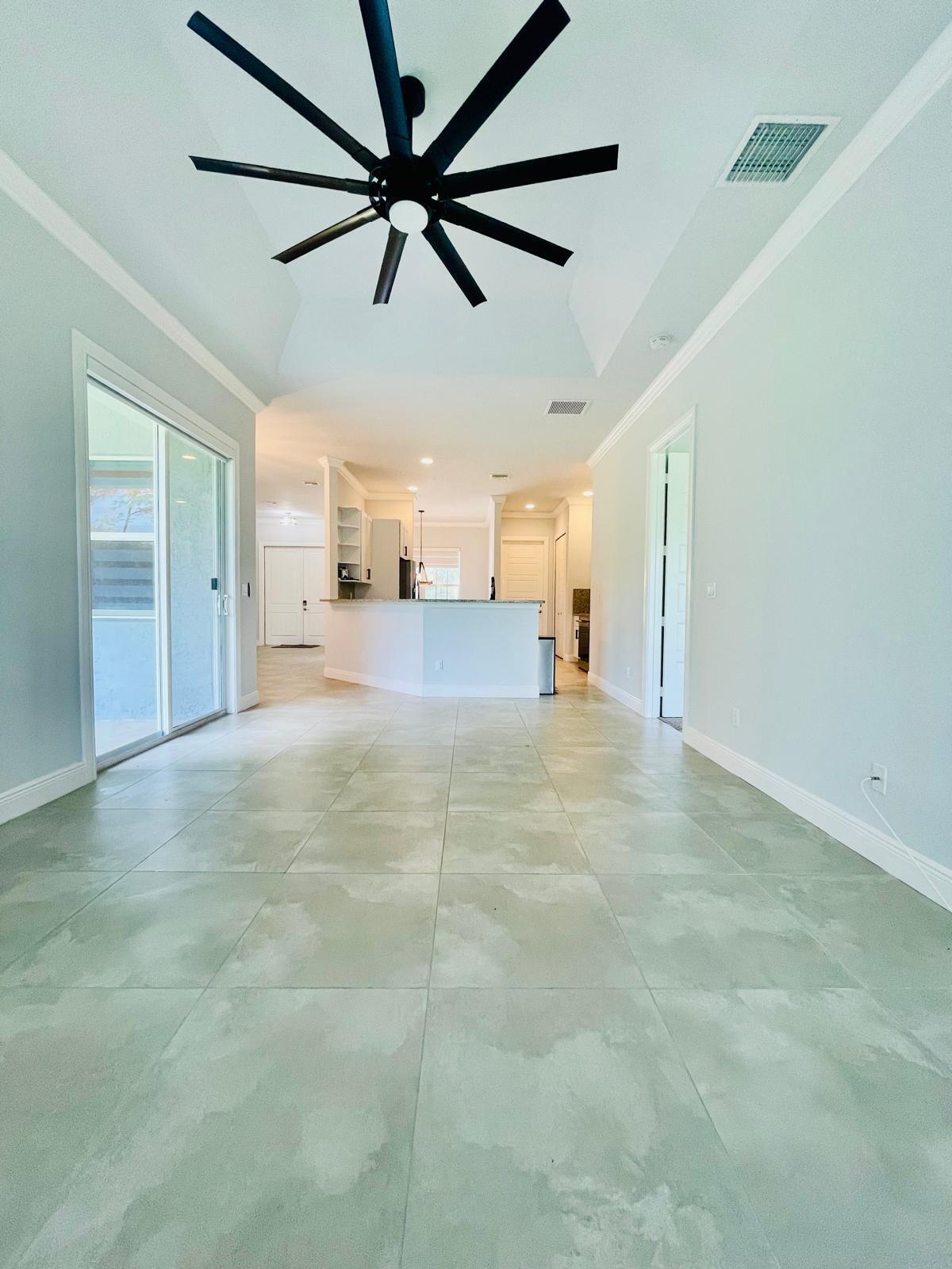 17225 78th Road North Loxahatchee, FL 33470 - Photo 15 of 93 a view of a livingroom with a ceiling fan