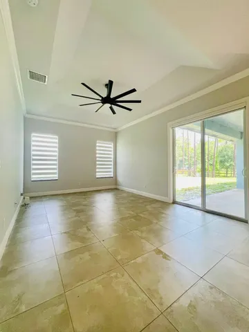 a view of a room with a window