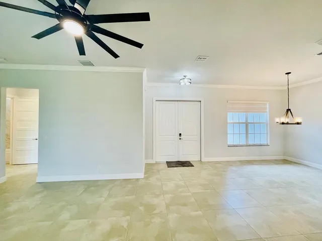 a aerial view of a house with a yard