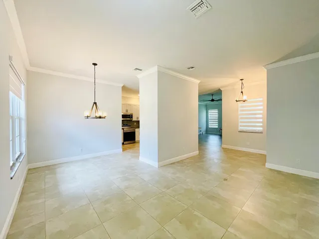 a view of a kitchen with a sink